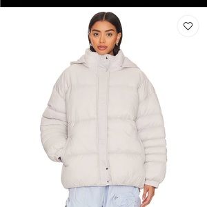 NWOT Light Pink Superdown Puffer jacket. Stock photo from Revolve to show fit.